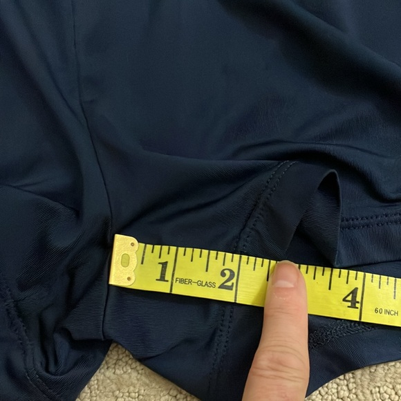 Great Greg Norman navy skort with navy and silver braid around waistband. - Picture 15 of 15